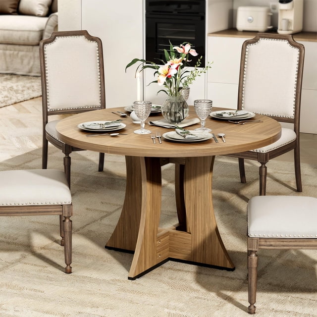 MARNUR Round Dining Table for 4 Persons, 47-inch kitchen table in walnut finish, crafted from engineered wood with a modern American design. The table features a spacious round surface supported by a sturdy base, ideal for dining rooms or kitchens. Suitable for casual meals or formal gatherings, shown in a dining setup with chairs and tableware.
