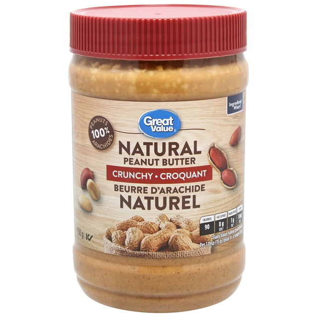 Great Value Beurre d'Arachide Naturel Croustillant dans un Pot en Plastique Transparent avec Couvercle Rouge, Montrant une Texture Épaisse, Beurre d'Arachide Texturé Fait à Partir d'Arachides 100 % Rôties à Sec. l'Étiquette Bilingue Comprend des Informations Nutritionnelles et une certification Sage des Ingrédients. Idéal pour l'Utilisation Alimentaire au Garde-Manger, l'Étalage sur du Pain Ou la Cuisson.