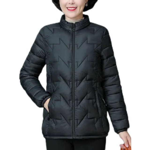 MAWCLOS Ladies Lightweight Solid Color Puffer Coats Winter With Pockets Down Jackets in Classic Black, size 4XL. This women's winter coat features a stand collar, long sleeves, and a hip-length design. Made from 100% polyester, it has a front zipper closure, elasticized cuffs, and two side pockets for convenience. The solid black color and quilted pattern provide a stylish and warm option for casual outings, traveling, or everyday wear during autumn and winter.