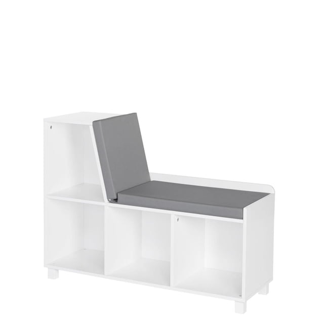 RiverRidge Home Book Nook Collection Storage Bench with Cubbies in White for Kids, featuring a white painted MDF frame with four open cubbies and a gray cushioned seat with an angled backrest, suitable for organizing children’s books and toys and providing a comfortable reading spot in playrooms or bedrooms.