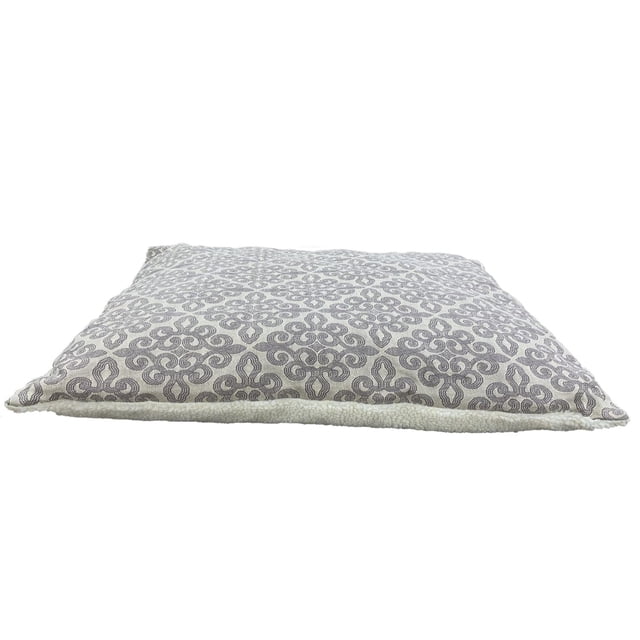 Vibrant Life Medium Sherpa Dog Pillow Bed in grey with jacquard fabric top featuring a geometric pattern and sherpa fleece bottom, filled with green poly fiber, shown from a low front angle on white background, ideal for medium dogs and suitable as a soft pet lounge cushion.