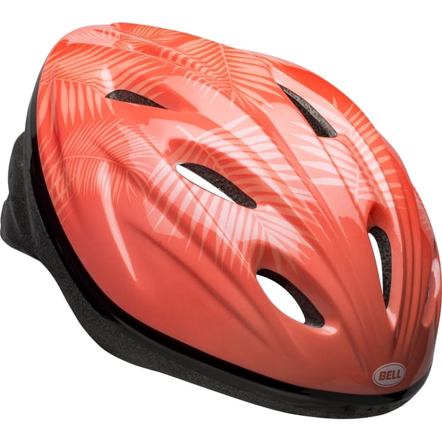 Bell Sports Cruiser™ Youth Bike Helmet in coral with white palm leaf pattern, featuring thirteen vents for airflow and a black foam base, shown in a 3/4 angled view highlighting its aerodynamic design and CPSC safety compliance for kids' bike helmets.