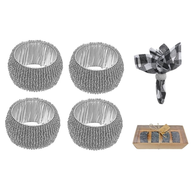 4PC Beaded Napkin Ring With Craft Box Silver featuring four round silver glass napkin rings with detailed beaded texture, displayed with a black and white checkered cloth napkin held by one ring, and a craft box packaging, ideal for enhancing dining table linens and décor.