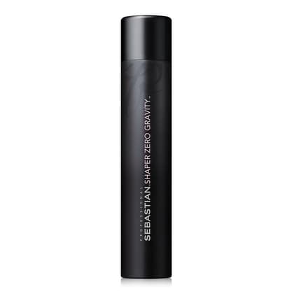 Sebastian Shaper Zero Gravity, Light Hold Hairspray 55% VOC 10.6oz in a sleek black cylindrical bottle with white text branding. This professional-grade hairspray offers a weightless, brushable, and light to medium hold, ideal for fine hair but suitable for all hair types. The product is designed for flexible styling with a satiny finish.