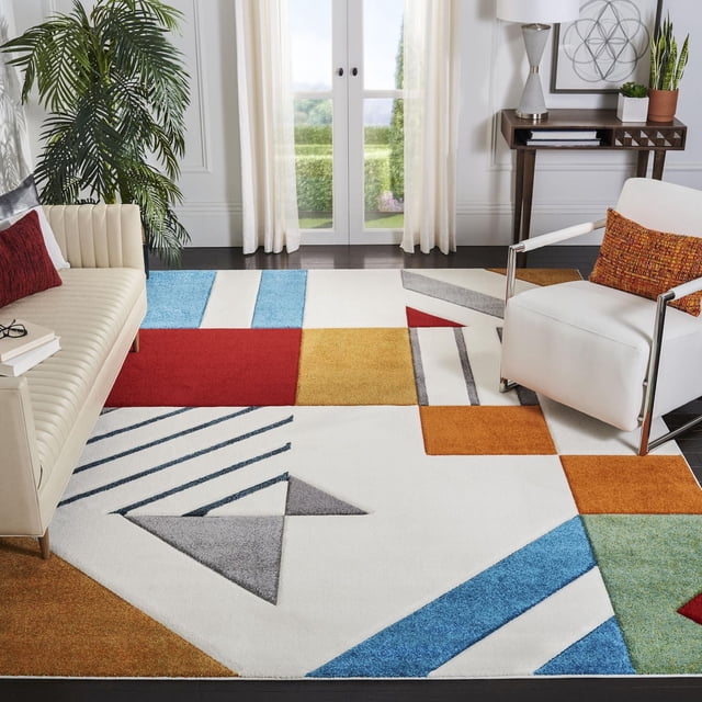 SAFAVIEH Hollywood Tapis Abstrait Becky au design Géométrique Moderne Mi-Siècle en Rouge Vif, Bleu, Moutarde, orange, Vert et Gris sur Fond Blanc, Fait de Fibres de Polypropylène Synthétiques Durables, Exposé dans un Salon Lumineux avec sofa Crème et Fauteuil Blanc avec Coussin orange, Idéal pour des accents de Déco Contemporaine.