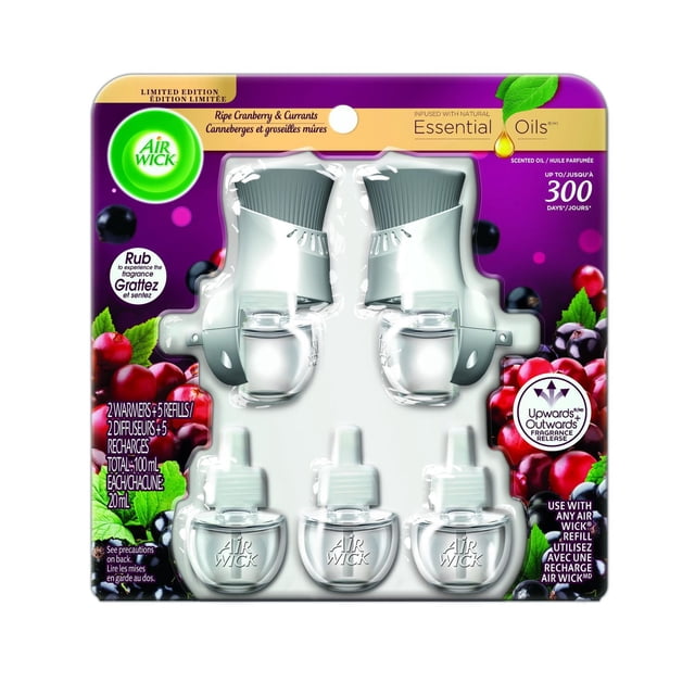 Air Wick Plug-in Air Freshener, Scented Oil Refills, Wild Berries, 2 Kits + 5 Refills with two silver plug-in warmers and five clear 20ml refill bottles, infused with natural essential oils and ripe cranberry and currants scent, offering up to 300 days of continuous fragrance with adjustable scent levels, suitable for home or office use and often used to freshen small enclosed spaces.