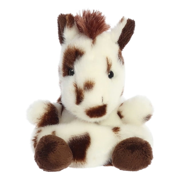 Aurora Palm Pals - Haymitch Painted Horse 5-inch plush toy. This soft and fluffy stuffed animal features a white body with brown patches, brown hooves, and a tuft of brown mane. Designed with high-quality materials and filled with bean pellets for stability, it is suitable for all ages.