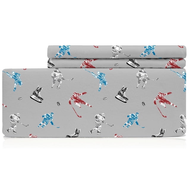 Johnson Home 160 GSM Comforter Sets with grey background featuring printed hockey players in red, blue, and white, hockey pucks, and skates, made from soft brushed flannel cotton, ideal for adding a sporty and cozy touch to bedroom bedding.