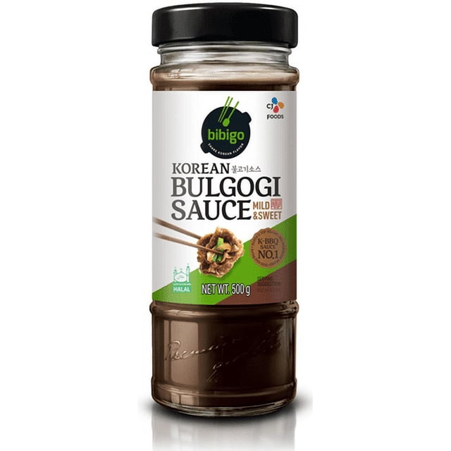 CJ Bibigo Korean Bulgogi Sauce Mild & Sweet 500g bottle with black lid and white label with green and brown accents, authentic Korean BBQ sauce suitable for marinating, grilling, and stir-frying meats, halal certified and labeled K-BBQ sauce No.1