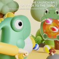 thumbnail image 3 of F Dinosaur Ball Launcher Toy With 12 Soft Elastic Balls And Shield Target Suit Indoor Shooting Game For Kids Hand Crank Rotation Continuous Shooting Safe Foam Bullets 430G 8.66X8.66X5.12 I, 3 of 5
