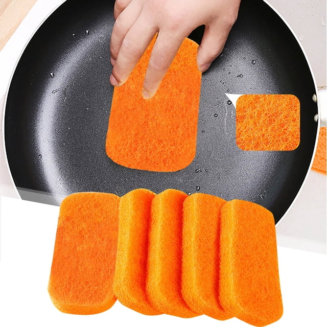 HANXIULIN Kitchen Cleaning Scrubber Sponge Scouring Pads in orange, shown in a set of 5 pieces. The image highlights one sponge being used to clean a non-stick pan, demonstrating its non-scratch and multifunctional cleaning capabilities. The sponges are made of durable foam, designed for long-lasting use and easy cleaning with just water. They can be cut into any shape for versatile cleaning applications across kitchen utensils, bathrooms, and other surfaces.
