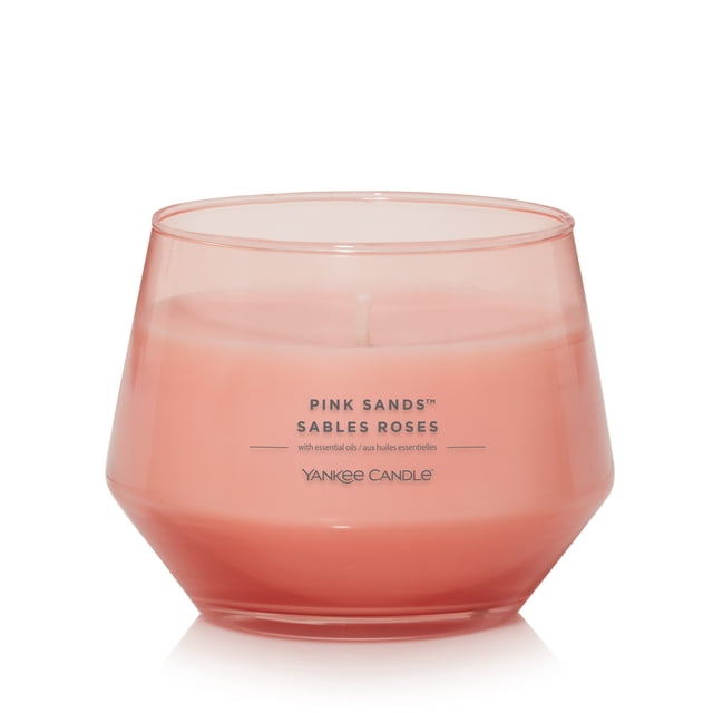 Yankee Candle Scented Candle, Pink Sands, 10 oz, Studio Collection, in a simple pink glass jar with a natural fiber wick and soy wax blend, providing up to 50 hours of burn time and a soothing exotic island fragrance made with essential oils, ideal for creating a calming home ambiance.