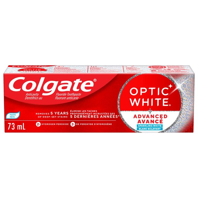 Colgate Optic White Advanced Sparkling White Toothpaste 73 mL tube in red and silver packaging with hydrogen peroxide for deep whitening and fluoride for anticavity protection, enamel safe and removes 5 years of deep-set stains.