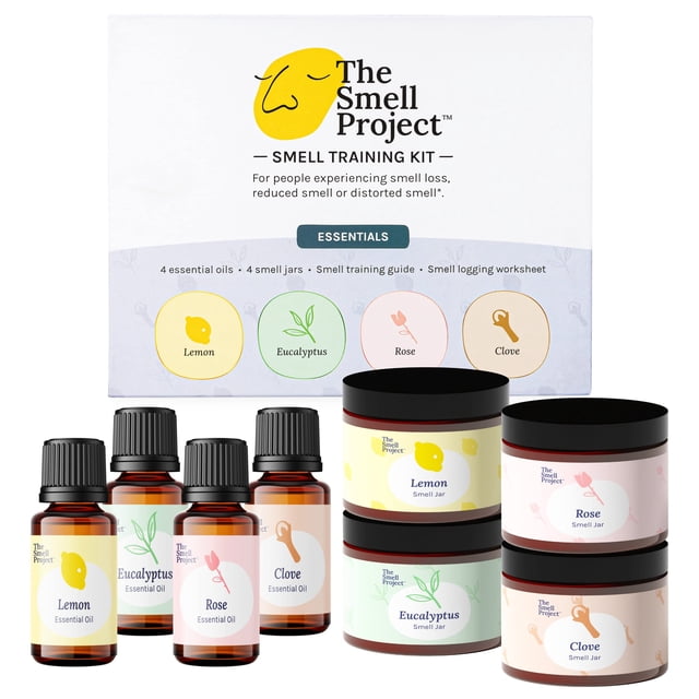 The Smell Project Smell Training Kit - Essentials, featuring four 10ml essential oil bottles (Lemon, Eucalyptus, Rose, and Clove) and matching smell jars. The kit includes a smell training guide and logging worksheet, designed for olfactory therapy and smell loss recovery. The packaging highlights the brand logo and product details.