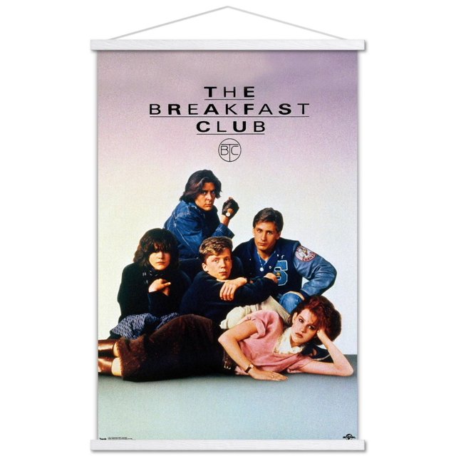 The Breakfast Club - One Sheet Wall Poster, 22.375" x 34" showing five teenagers in 1980s casual clothing posed in a relaxed group on a light purple background with the movie title in bold black text above, printed on glossy poster paper with a white wooden hanging frame, suitable for bedroom or dorm wall decor.