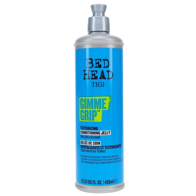 Gimme de Tête de Lit TIGI Gelée Texturisante Revitalisante Prise 13,53 oz Photo de Produit Montrant le Contenant Étiqueté Tête de Lit TIGI de Gelée Texturisante Revitalisante; une Gelée Hydratante et Coiffante pour les Cheveux Qui Développe la texture pour des looks Désordonnés et Défaits, Aide à Recréer les Cheveux du Jour après, et Est Souvent Utilisée pour Rafraîchir les styles du Deuxième Jour.