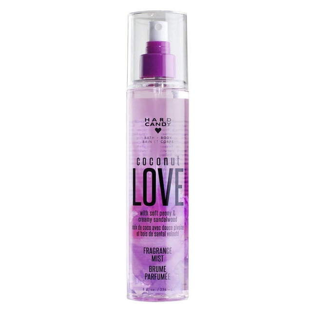 Hard Candy Coconut Love Fragrance Mist in a clear 236 mL spray bottle with purple liquid and nozzle, offering a tropical coconut scent with soft peony and creamy sandalwood notes, suitable as a body spray and bath fragrance mist for women.