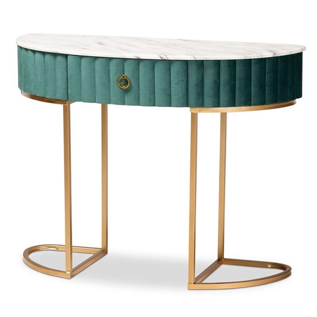 Baxton Studio Brush Gold Finish 1-Drawer Console Table with Faux Marble Tabletop. This console table features a semi-circular faux marble tabletop supported by brushed gold-tone metal legs. The drawer is upholstered in green velvet polyester fabric with channel tufting and includes a gold-tone metal ring pull. Constructed from MDF wood, metal, and polybutylene, it offers a luxurious aesthetic and functional storage. Ideal for entryways or hallways, its slim design fits well in tight spaces. Assembly required.