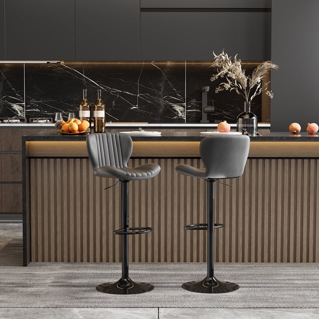 Walsunny Adjustable Bar Stools Set of 2 in black leather upholstery, featuring swivel counter seats with a scalloped design and large metal bases. The stools are shown in a modern kitchen setting with a black marble backsplash and a wooden counter. The adjustable height and 360-degree swivel functionality are highlighted, along with the non-slip base for safety and floor protection.