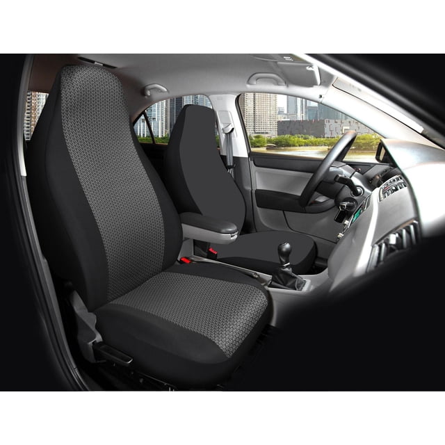 Auto Drive 1-Piece Atlanta Front Car Seat Cover Black/Grey fitted on a front car seat inside a sedan, featuring black and grey jacquard polyester fabric with a textured pattern on the seating area and smooth black sides, designed for full seat protection and airbag compatibility, shown with a manual gear shift and city buildings visible outside the window.