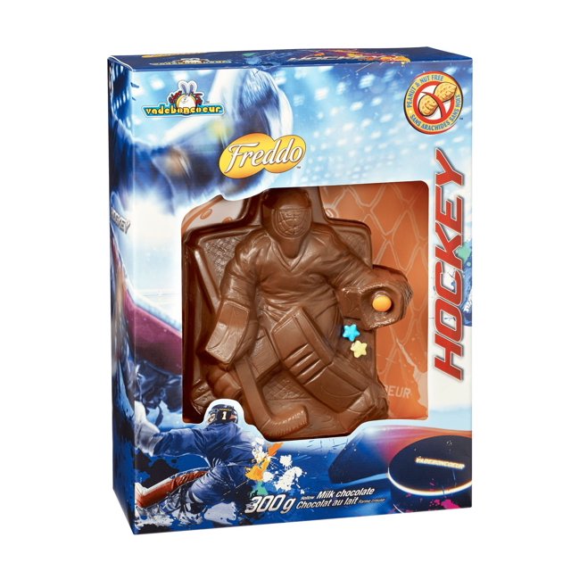 Freddo Goalie hollow milk chocolate shaped as a hockey goaltender in a blue and orange box with hockey-themed graphics, peanut free, nut free, gluten free, made in Canada, 300g, often used as a themed gift or snack.