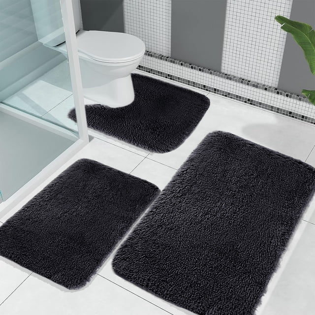 Suncoda 3 Pcs Bathroom Rugs in black, crafted with velvet fleece and memory foam for a soft, plush feel. Includes a toilet mat, shower rug, and bath mat, all featuring non-slip rubber backing and water absorbent properties. Machine washable and suitable for bathroom floors and toilet areas.