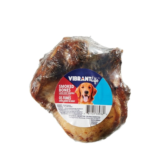 Vibrant Life Knuckle large smoked beef knuckle dog treat wrapped in clear plastic with a blue and red label showing product name and barcode, an all-natural, high-protein, low-fat chew ideal for rewarding dogs.