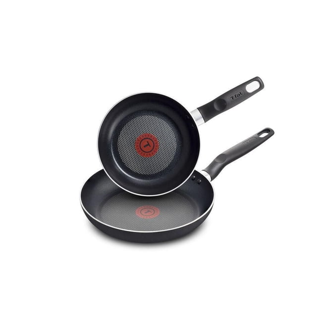 T-fal Ensemble Essentiel de 2 Poêles à Frire (20/26 cm) avec Deux Poêles à Frire Noires Antiadhésives Dotées d'Un Revêtement Résistant aux Rayures, de Poignées en Bakélite Rivetées et d'Indicateurs de Chaleur Thermo-Spot Rouges Brevetés Qui Indiquent Quand les Poêles Atteignent la Température de Cuisson Idéale, compatible avec Toutes les Tables de Cuisson sauf l'Induction.