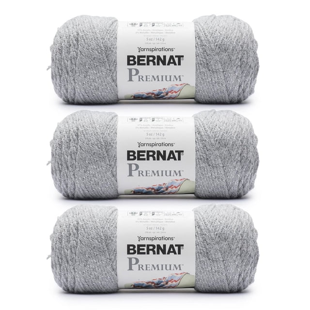 Bernat® Premium™ Sparkle Yarn (3 Pack) with three skeins of medium worsted weight acrylic yarn containing 3% metallic fiber in light grey, each 5 oz (142 g) and 258 yards, arranged horizontally with labels showing brand and care instructions, suitable for knitting, crochet, and adding subtle shimmer to projects.