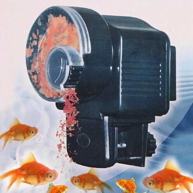 LSLJS Distributeur Automatique de Nourriture pour Poisson avec Minuterie Automatique, Réservoir Numérique pour Animaux de Compagnie, Étang d'Aquarium Noir, Doté d'Un design compact avec une Boîte d'Alimentation Transparente Distribuant de la Nourriture pour Poisson Rouge. le Distributeur Est programmable pour jusqu'à Quatre Tétées par Jour et Fonctionne avec de la Nourriture Sèche en Vrac Ou en Granules. Il Comprend une Horloge Numérique Intégrée pour la Précision et Peut Être Monté Autoportant Ou sur Rebord. Convient à Divers Aquariums et Animaux de Compagnie comme le Poisson Rouge et le Poisson betta.