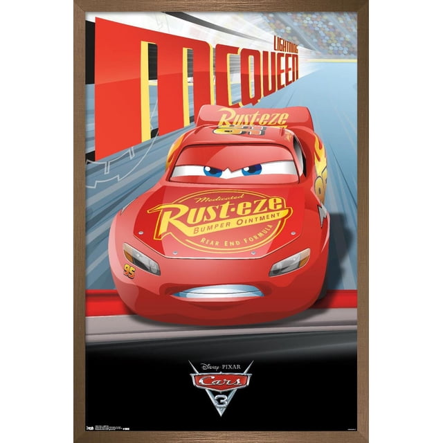 Disney Pixar Cars 3 - Lightning Wall Poster, 22.375" x 34" framed, showing a front-facing Lightning McQueen with red body and yellow Rust-eze logo on the hood, number 95 on the side, racing on a blurred track with large red and yellow 'McQueen' text behind, framed in brown wood, suitable for kids' room decor or party wall art.