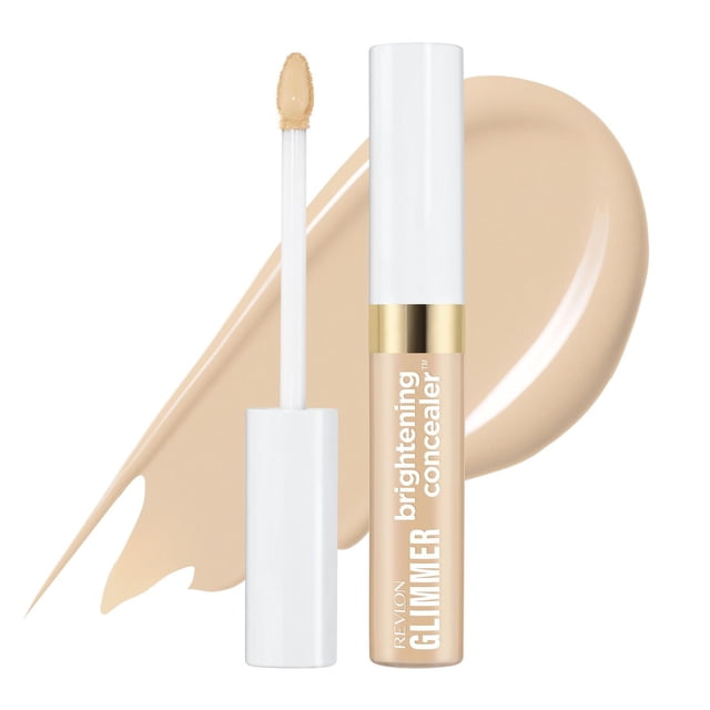 Glimmer Concealer™ Éclaircissant avec Couvrance Modulable en tube Blanc et Or avec Applicateur, Montré avec un Cache-Cernes beige derrière. Cette Formule Légère Illumine et Corrige la Couleur sous les Yeux, Lisse les Ridules et Peut Être Utilisée sur les points Hauts du Visage pour une Finition Impeccable.