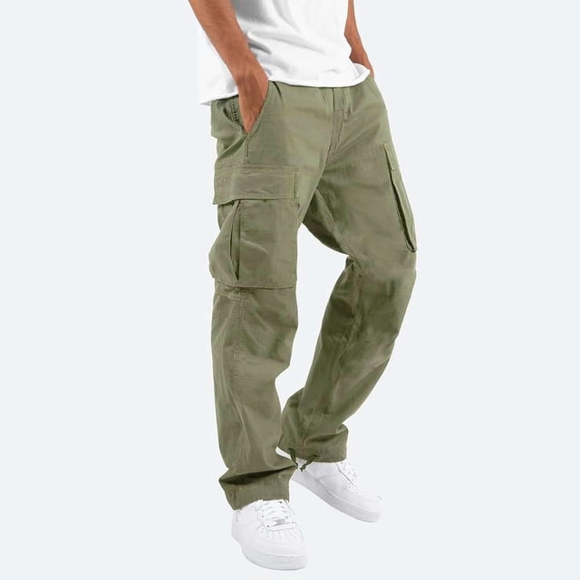 Pantalon de Mise en Forme Droit pour Hommes Uni Décontracté à Multiples Poches, Pantalon Cargo, Pantalon en Couleur Vert olive. Conçu avec Fermeture à Cordon, Taille Élastique et Multiples Poches Utilitaires pour Plus de Commodité. Fabriqué en Mélange Respirant Coton-Polyester, Idéal pour les Activités de Plein Air, le jogging et les Tenues Décontractées. Montré sur une Vue Pleine Longueur Assorti à des Espadrilles Blanches.