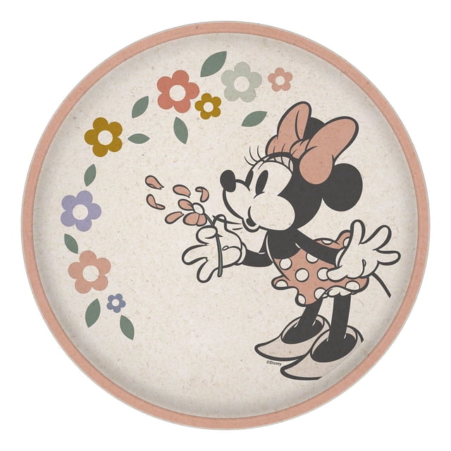 Zak Designs Minnie 8" Dinner Plate made from durable melamine and bamboo fibers, featuring a round beige speckled surface with a full-color image of Minnie Mouse in a pink polka-dot dress and bow holding a flower, surrounded by pastel flowers and leaves, with a pink rim to help prevent spills, BPA free and dishwasher safe, suitable for children's dining.