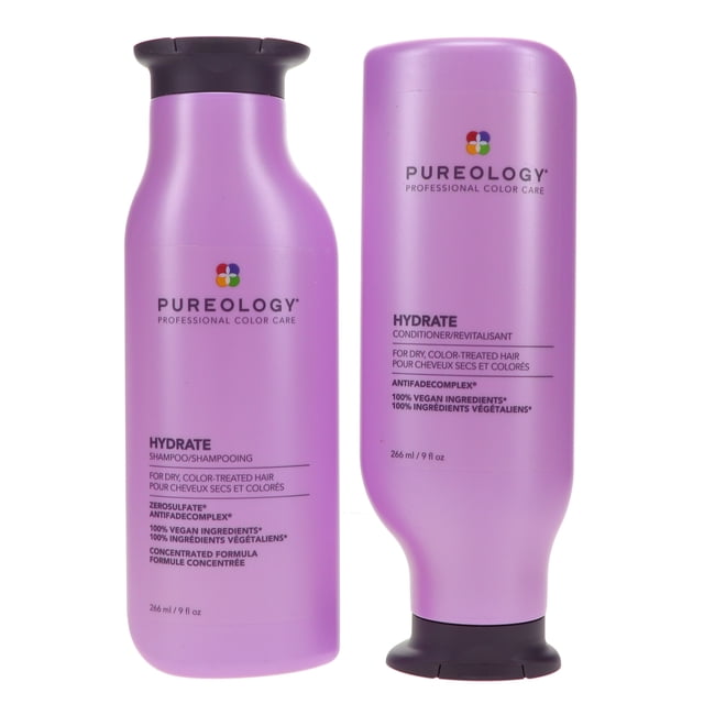 Pureology Hydrate Shampoo 9 oz and Hydrate Conditioner 9 oz combo pack featuring two purple bottles with black caps. Ideal for dry, color-treated hair, these luxury hair care products include the AntiFade Complex to protect hair color and deeply moisturize without heaviness. Made with 100% vegan ingredients, both bottles display the Pureology logo and product details in English and French.