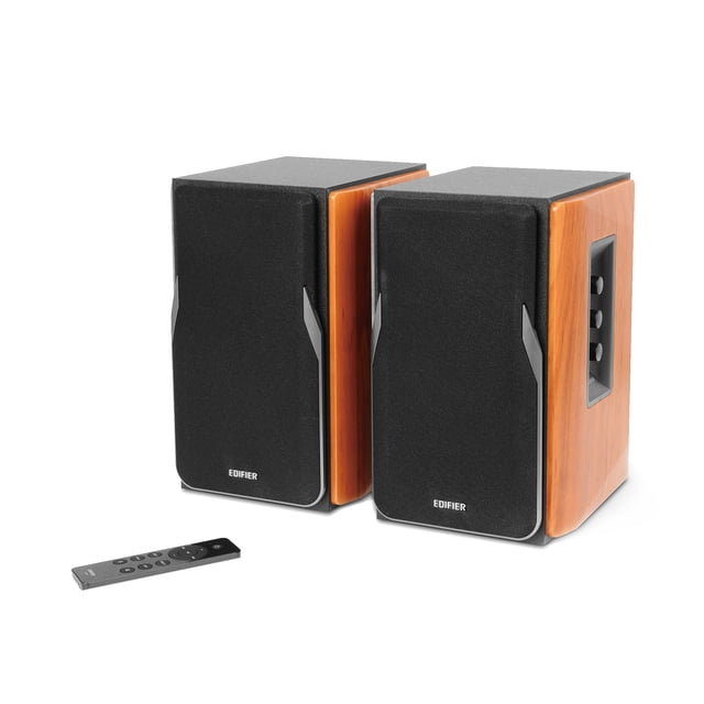 Edifier R1380DB Haut-Parleurs de Bibliothèque Bluetooth Actifs avec Fini grain de Bois, Conçus comme Haut-Parleurs de Moniteur de studio Sans Fil 2.0. Les Fonctionnalités Incluent un tweeter de 1 Pouce, un Caisson de Basses de 4 Pouces, une Sortie d'Alimentation RMS de 42 W, et des options de Connectivité Polyvalentes comme l'Optique, le Coaxial, l'Entrée Ligne et Bluetooth. Inclut une Télécommande et des Commandes du Panneau Latéral pour une Utilisation Pratique.