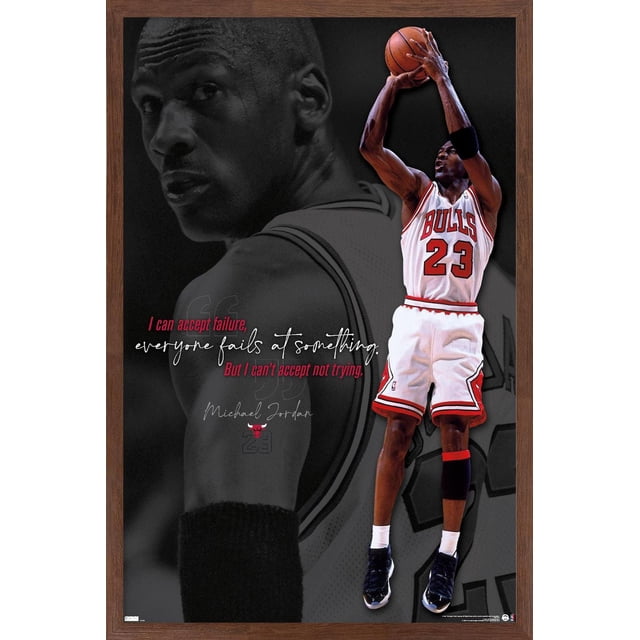 Michael Jordan - Can't Accept Not Trying Wall Poster, 22.375" x 34" featuring Michael Jordan in a white Chicago Bulls jersey number 23, jumping to shoot a basketball. The poster includes a grayscale background close-up of his back and a motivational quote in red and white text: "I can accept failure, everyone fails at something. But I can't accept not trying." It is printed on glossy paper and framed in a dark wood magnetic frame, suitable for home décor and motivational wall art.