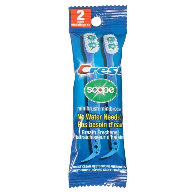 Crest Scope Outlast Minibrush 2 Pk avec Deux Brosses à Dents de Voyage Compactes Bleues avec Manches Inclinés et Poils Blanc-Vert, Conçues pour Rafraîchir l'Haleine Sans Eau, Idéales pour les Soins Buccodentaires Format Voyage et une Utilisation Pratique en Déplacement.