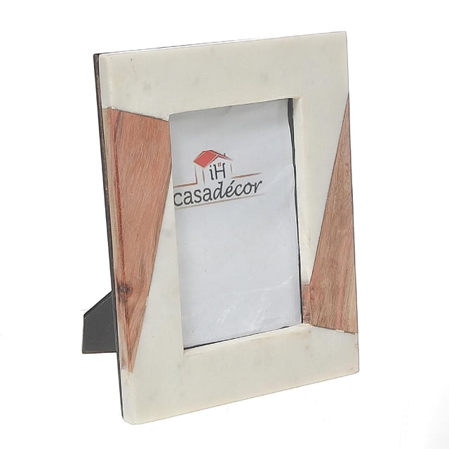 White Marble & Wooden Picture Frame 6X4 with a rectangular white marble border accented by natural wood inlays on two corners, designed to display 6x4 photos, standing on a black easel back, suitable for adding a durable and elegant touch to home décor.