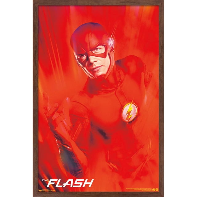 DC Comics TV - The Flash - Key Art Wall Poster, 22.375" x 34", depicting The Flash in his red suit with the yellow lightning bolt emblem on his chest, in a centered, front-facing pose with motion blur and light streaks on a vibrant red background, framed in dark wood, ideal for home or office wall décor.