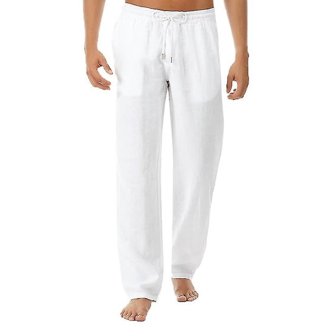 Pantalon Ample Décontracté pour Homme à Effet Lin, Élastiqué, Blanc, Coupe Ample avec Taille Élastique et Cordon de Serrage. Fabriqué en polyester Respirant à texture Façon Lin, Ce Pantalon Est Conçu pour un Usage Décontracté et Quotidien pendant l'Été. l'Image Montre une Vue Frontale du Pantalon Porté par un Modèle, Mettant en Valeur Sa Coupe Décontractée et la Couleur Unie Blanche.