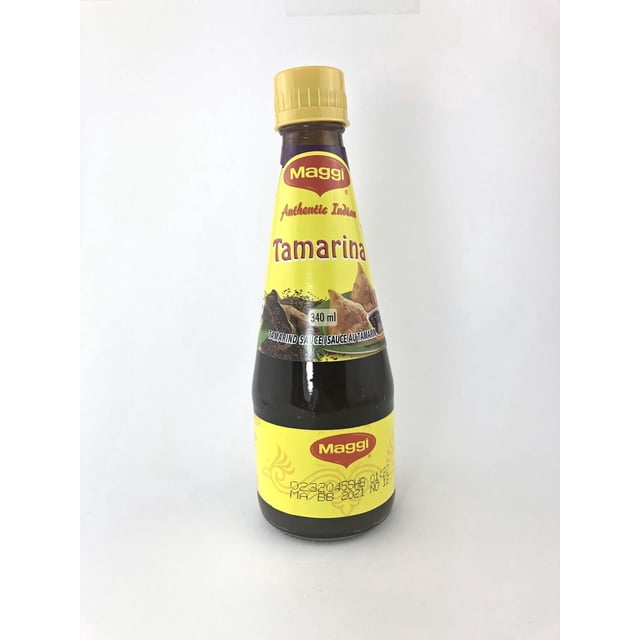 Maggi Tamarind Sauce bottle with yellow cap and label featuring the Maggi logo and 'Authentic Indian Tamarind' text, containing 340 ml of dark brown tamarind sauce blended with cumin, ginger, and Indian red chilli powder, suitable for adding tangy and spicy flavour to Indian dishes, shown on a plain white background.