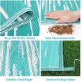 thumbnail image 4 of Findosom 6'x9' Waterproof Stripe Outdoor Rug, Foldable Reversible Plastic Straw Rug, Large Patio Rug for Outdoors, RV, Patio, Backyard, Deck, Picnic, Beach, Camping Blue, 4 of 6
