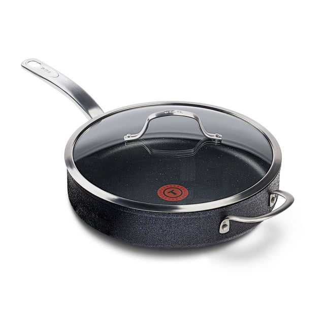 T-fal Stone Shield 5 Qt / 11.8" Jumbo Cooker with DefenseShield™ Technology, featuring a deep, round shape with rugged stone-textured exterior, riveted stainless steel handles, glass lid with metal rim, and a red Thermo-Spot® heat indicator on the non-stick interior, dishwasher and oven safe up to 400°F, compatible with multiple cooktops.