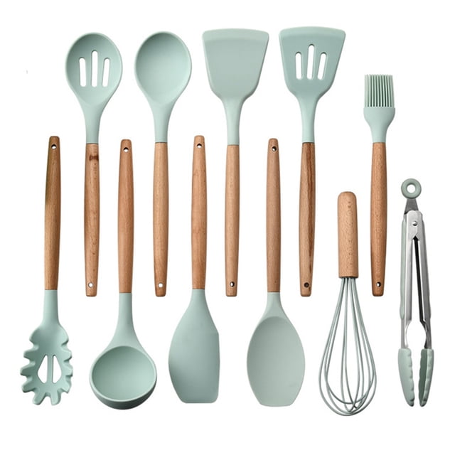 Amdohai 11PCS Cooking Utensils Kitchen Utensil Set with silicone heads and wooden handles. Includes tools like a slotted spoon, ladle, spatula, whisk, and tongs in a light green color. Heat-resistant up to 392°F (200°C), these utensils are safe for non-stick cookware and feature large hanging holes for organized storage. Suitable for home or restaurant kitchens.