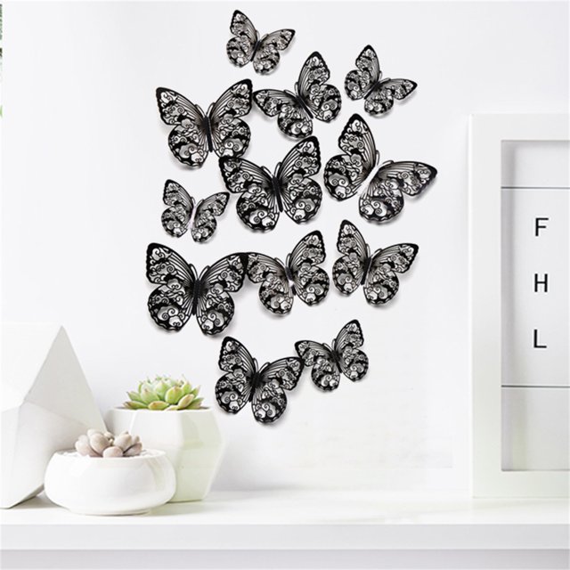 TIMIFIS Décoration pour la Maison 12 Pcs Ensemble d'Autocollants Muraux 3D à Texture Métallique Papillon Creux Disposés sur un Mur Blanc. Ces Décalcomanies Papillon Creux à Texture Métallique Créent un Effet 3D Charmant, Idéal pour la Déco de la Maison, les Décalcomanies Murales Ou les Décorations d'Événements comme les Mariages et les baby showers.
