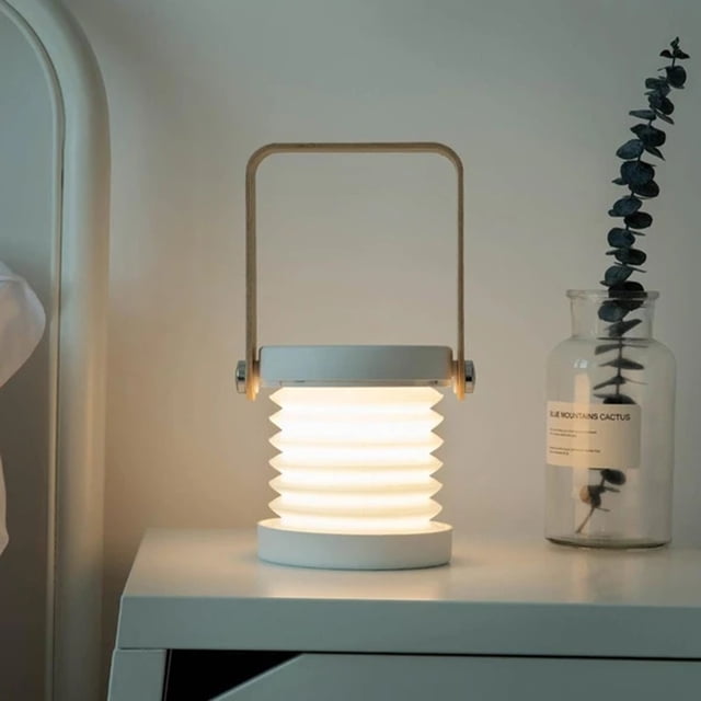 RKSTN Night Light, LED Lights Portable Reading LEDSmall Desk Lamp with a retractable folding design, warm white LED light, and minimalist art style. Features include a hangable handle, third gear dimming, and a built-in 1200mAh rechargeable lithium battery. Ideal for bedside tables, reading, or creating a cozy ambiance in indoor spaces.