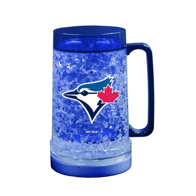 The Sports Vault Light Up Freezer Mug Toronto Blue Jays is a 16 oz double-wall plastic mug with freezable crystal-gel insulation, a printed Toronto Blue Jays logo featuring a red maple leaf, and a removable LED base with three light settings to keep drinks cold and show team pride.
