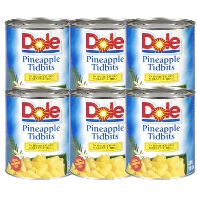 DOLE Pineapple Tidbits in Juice, Premium Canned Tropical Fruit, 2.84 L (100 fl oz) Bulk Foodservice Can, Case of 6. The image displays six large cans of DOLE Pineapple Tidbits, each featuring the brand logo and product description. Packed in 100% natural pineapple juice, these tidbits are pre-cut into uniform, bite-sized pieces, making them ideal for high-volume kitchens, catering, and restaurant use. Suitable for Hawaiian pizzas, tropical glazes, and fruit salads.