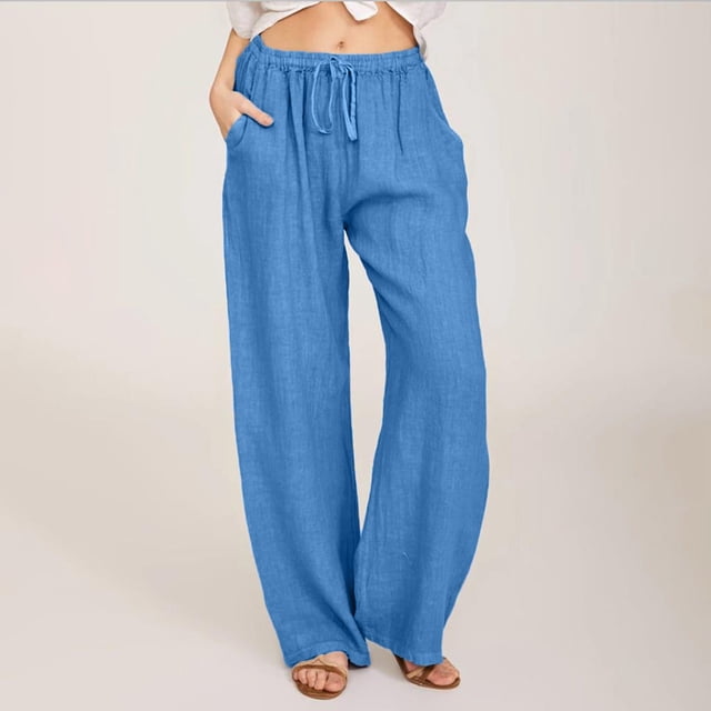 drppepioner Women Casual Solid Cotton Linen Drawstring Elastic Waist Long Wide Leg Pants in a light blue colour. These pants feature a relaxed fit with a drawstring elastic waistband, wide legs, and side pockets. Suitable for casual wear or seaside holidays, made from a breathable cotton-linen blend. Shown on a model with a neutral background.